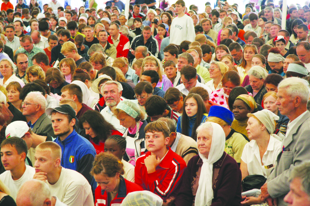 Russian people attending a Gospel Service